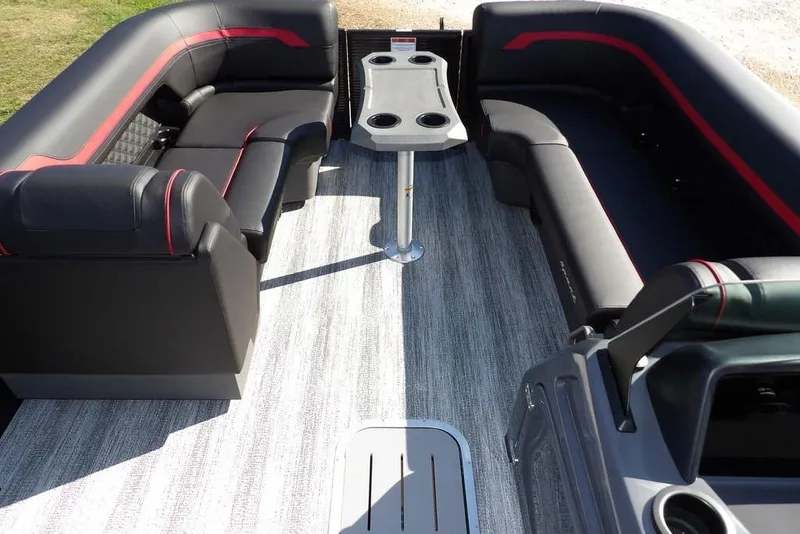 Slide: The Image of 2026 Bennington S Swingback 22 SSB interior with sleek seating and central table. - 16