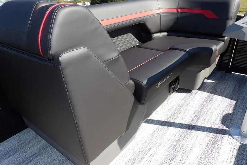 Slide: The Image of 2026 Bennington S Swingback 22 SSB boat interior with sleek black and red seating. - 19