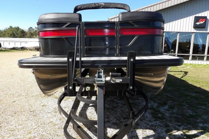 Slide: The Image of 2026 Bennington S Swingback 22 SSB pontoon boat on trailer, rear view. - 2