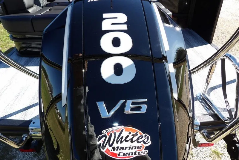 Slide: The Image of Close-up of a 2026 Bennington S Swingback 22 SSB boat engine, featuring a 200 V6 motor. - 36