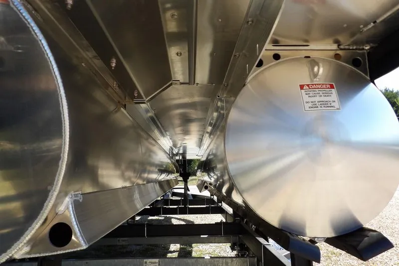 Slide: The Image of Underneath view of 2026 Bennington S Swingback 22 SSB pontoon boat, showcasing metal structure. - 43