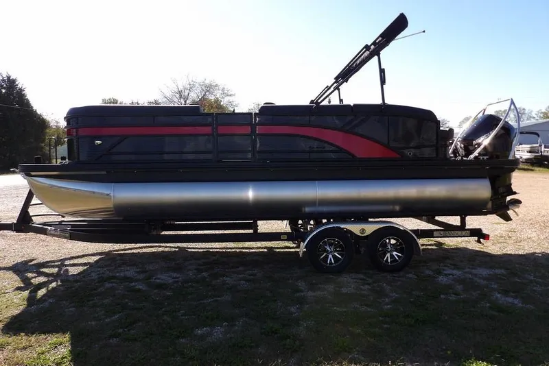 Slide: The Image of 2026 Bennington S Swingback 22 SSB pontoon boat on trailer, side view. - 5