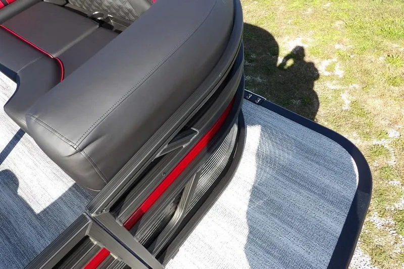 Slide: The Image of 2026 Bennington S Swingback 22 SSB boat seat with sleek black and red design. - 9