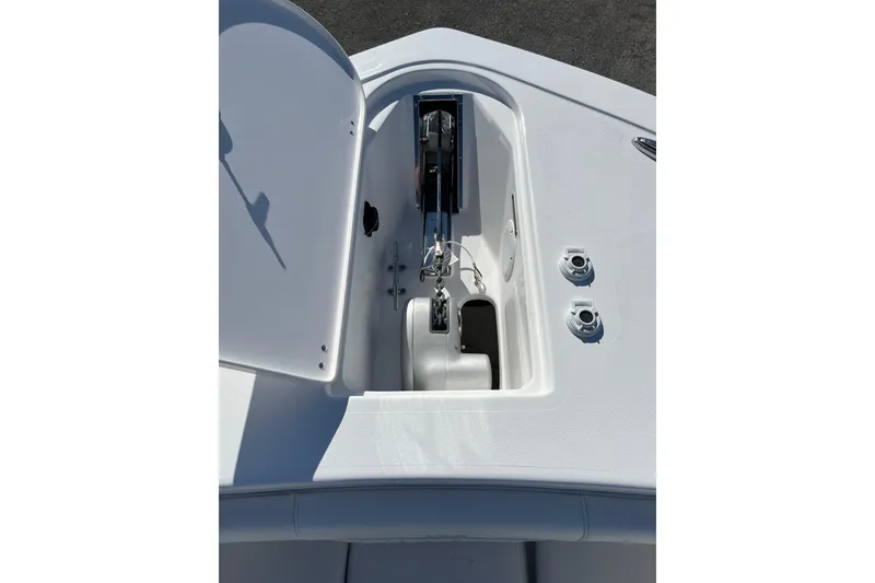 Slide: The Image of Open anchor compartment on 2026 Tidewater 272 CC Adventure boat. - 9