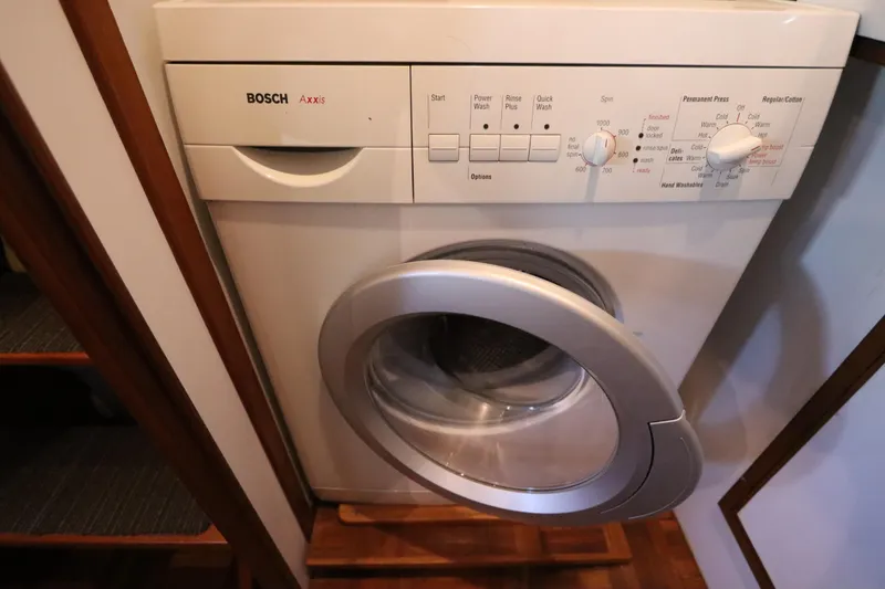 Slide: The Image of Bosch Axxis washing machine in 2005 DeFever 49 Cockpit Motor Yacht interior. - 108