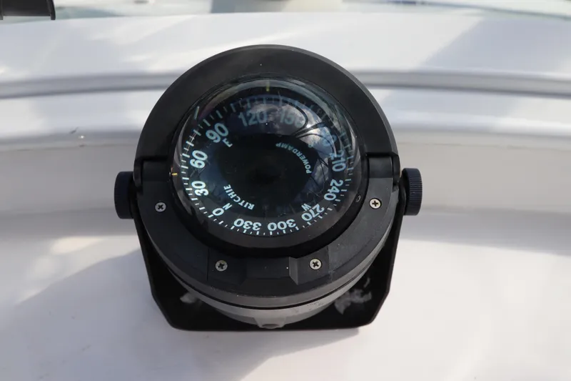 Slide: The Image of Compass on 2005 DeFever 49 Cockpit Motor Yacht, displaying navigational directions. - 39
