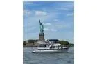 Slide: The Image of 2005 DeFever 49 Cockpit Motor Yacht near the Statue of Liberty on a sunny day. - 6