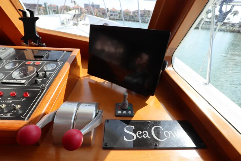 Slide: The Image of Control panel of 2005 DeFever 49 Cockpit Motor Yacht with "Sea Cow" nameplate. - 65