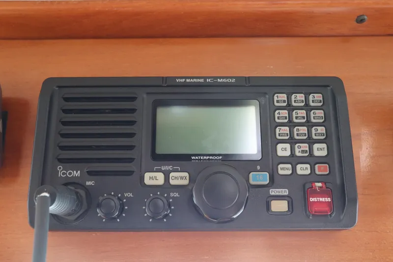 Slide: The Image of VHF marine radio on 2005 DeFever 49 Cockpit Motor Yacht dashboard. - 70