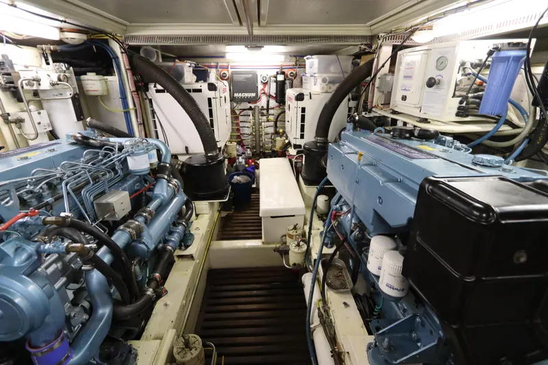 Slide: The Image of Engine room of 2005 DeFever 49 Cockpit Motor Yacht with dual engines and equipment. - 90