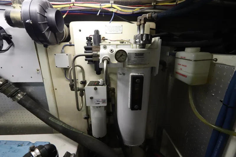 Slide: The Image of Engine room of 2005 DeFever 49 Cockpit Motor Yacht with mechanical components. - 96