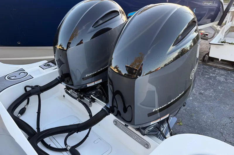 Slide: The Image of Twin Yamaha outboard engines on a 2023 NauticStar 2602 Legacy boat. - 11