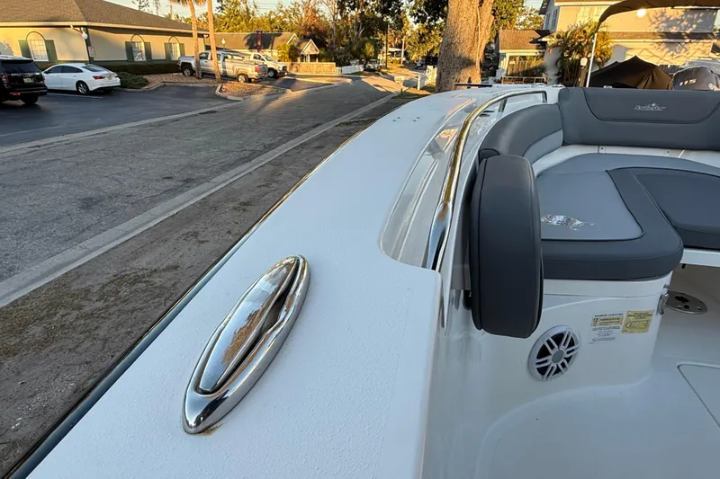 Slide: The Image of 2023 NauticStar 2602 Legacy boat with sleek seating and chrome details. - 44