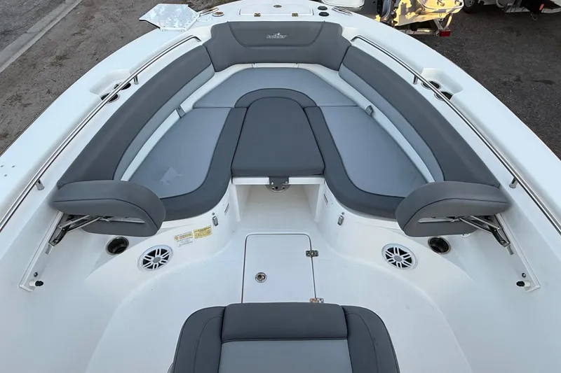 Slide: The Image of 2023 NauticStar 2602 Legacy boat interior with gray cushioned seating. - 50