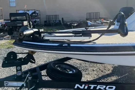 Slide: The Image of 2024 Nitro Z17 boat on trailer, featuring a mounted trolling motor. - 4