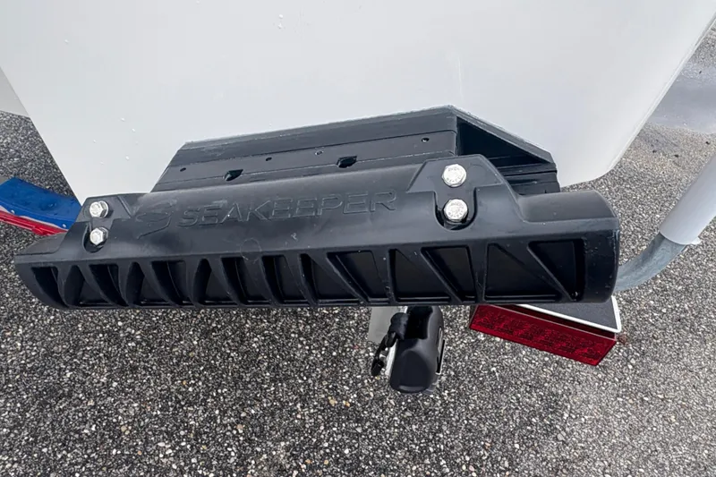 Slide: The Image of Alera M 25L 2026 boat with Seakeeper stabilizer on trailer. - 11
