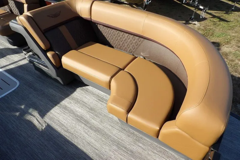 Slide: The Image of Luxurious seating on 2026 Bennington M L-Bench 22 ML pontoon boat, featuring elegant brown upholstery. - 15