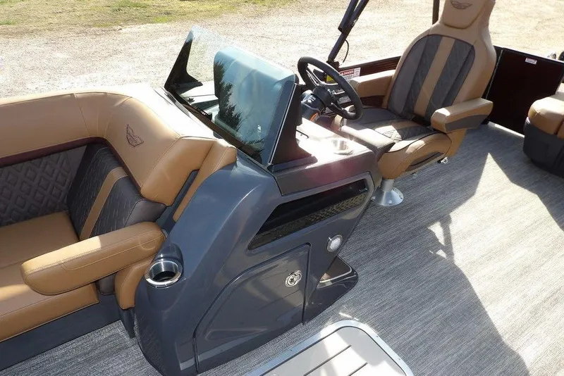 Slide: The Image of 2026 Bennington M L-Bench 22 ML boat interior with luxurious seating and modern dashboard. - 18