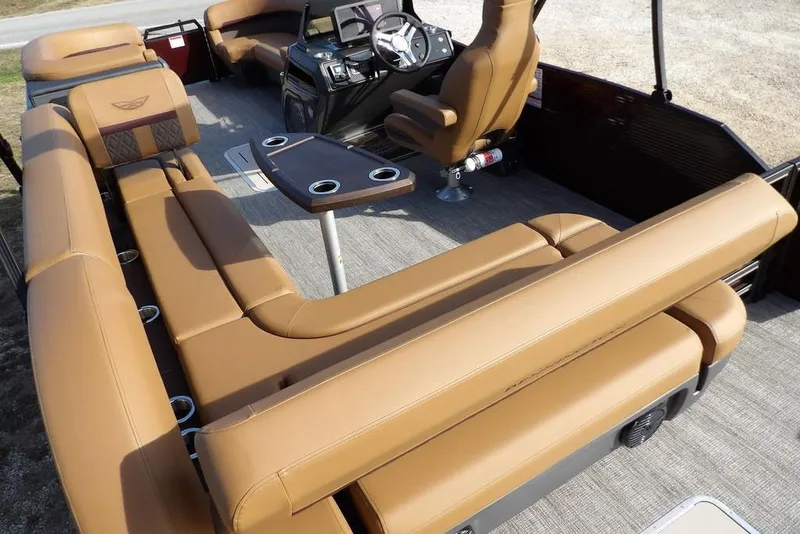 Slide: The Image of 2026 Bennington M L-Bench 22 ML pontoon boat with luxurious tan seating and modern console. - 35