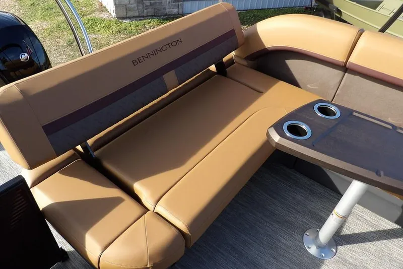 Slide: The Image of Luxurious seating on 2026 Bennington M L-Bench 22 ML pontoon boat with cup holders. - 36