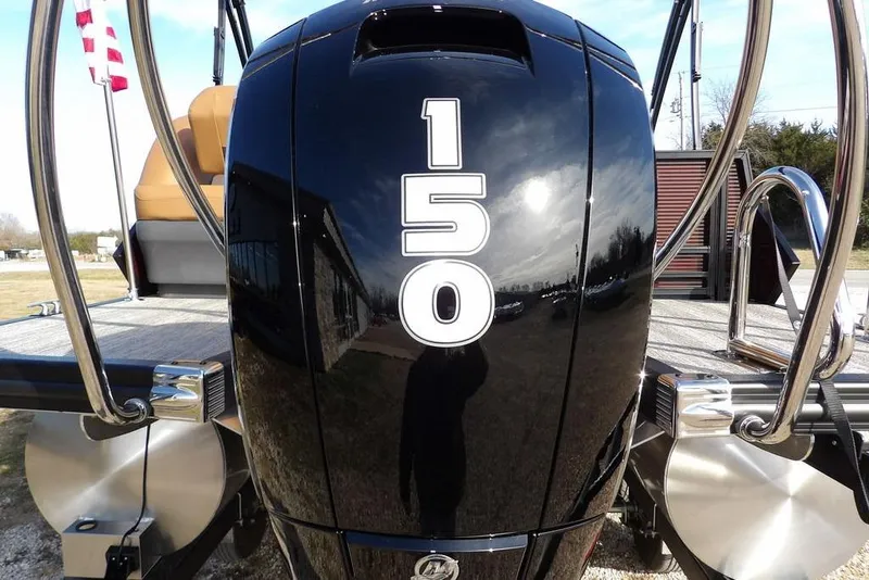 Slide: The Image of 2026 Bennington M L-Bench 22 ML boat with 150 HP engine, rear view. - 40