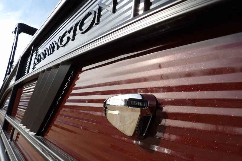 Slide: The Image of Close-up of 2026 Bennington M L-Bench 22 ML boat with metallic finish. - 46