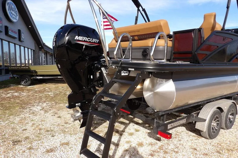 Slide: The Image of 2026 Bennington M L-Bench 22 ML pontoon boat with Mercury outboard motor and trailer. - 47