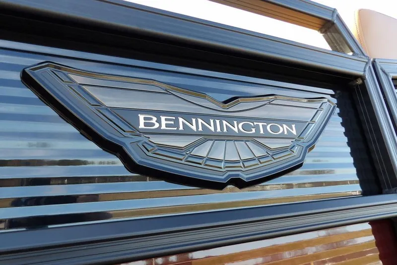 Slide: The Image of 2026 Bennington M L-Bench 22 ML logo on sleek, reflective surface. - 48