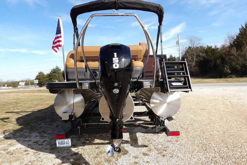 Slide: The Image of 2026 Bennington M L-Bench 22 ML pontoon boat with powerful outboard motor. - 9