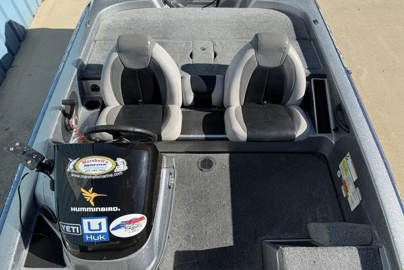 Slide: The Image of 2012 Skeeter TZX190 boat interior with dual seats and control panel. - 10