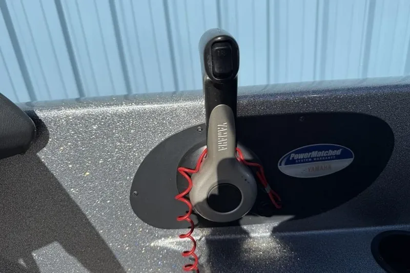 Slide: The Image of Yamaha throttle control on 2012 Skeeter TZX190 boat dashboard with PowerMatched system warranty. - 14