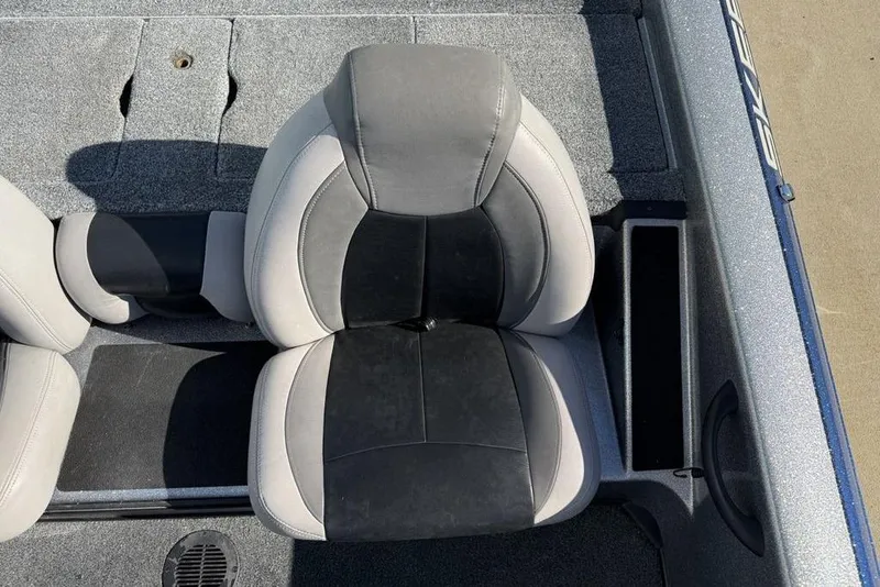Slide: The Image of 2012 Skeeter TZX190 boat seat with gray and black upholstery. - 22