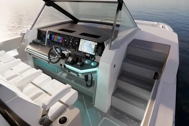 Slide: The Image of 2026 Aquila 45 Sport yacht cockpit with modern controls and seating, overlooking calm waters. - 5