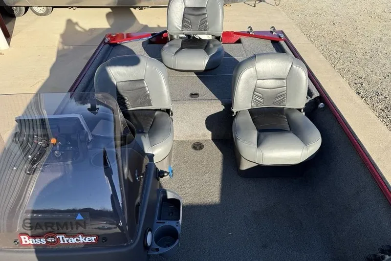 Slide: The Image of 2021 Tracker Bass Tracker Classic XL boat interior with three gray seats. - 13