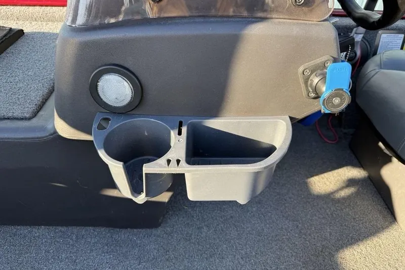 Slide: The Image of Cup holder and storage on 2021 Tracker Bass Tracker Classic XL boat console. - 14