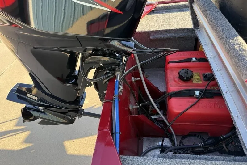 Slide: The Image of 2021 Tracker Bass Tracker Classic XL boat engine and fuel tank compartment. - 24