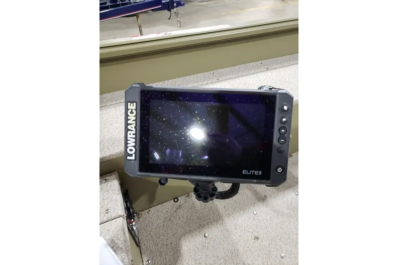 Slide: The Image of Lowrance Elite fish finder on 2024 Lund 1675 Alaskan Tiller boat. - 8