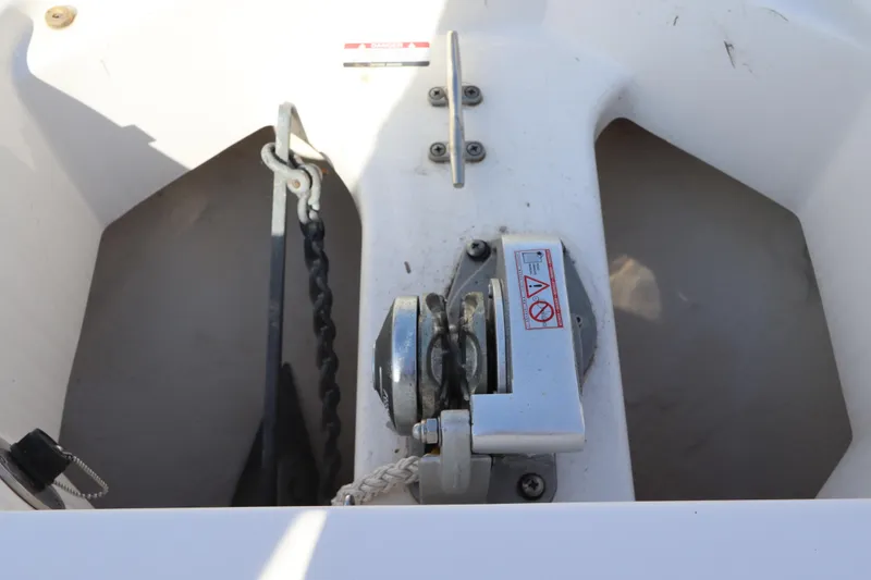 Slide: The Image of 2019 Robalo R242 Center Console anchor winch and chain detail. - 25