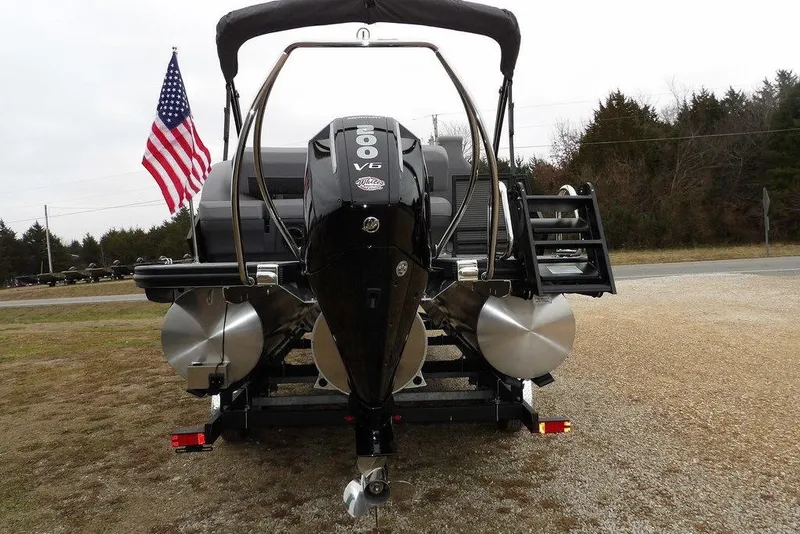 Slide: The Image of 2026 Bennington M L-Bench 22 ML pontoon boat with 300 V6 engine and American flag. - 11