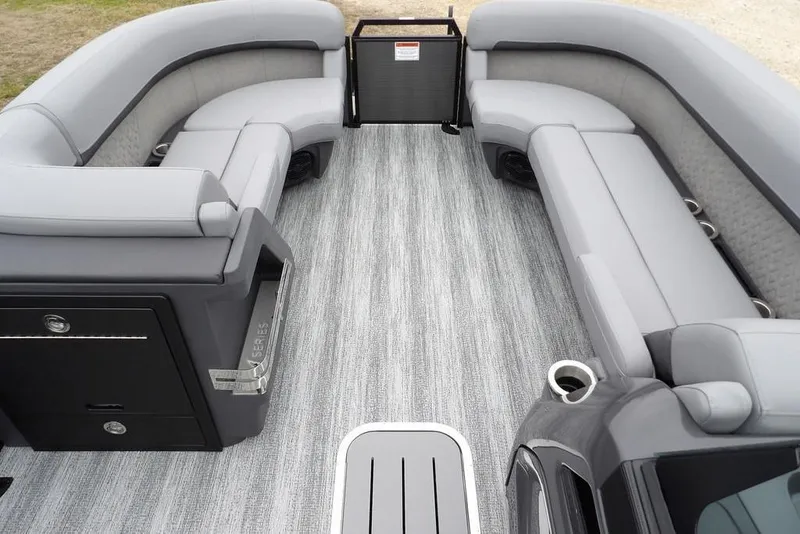 Slide: The Image of 2026 Bennington M L-Bench 22 ML pontoon boat interior with gray seating and flooring. - 13