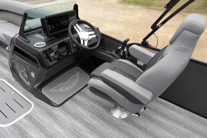 Slide: The Image of 2026 Bennington M L-Bench 22 ML boat interior with modern steering console and seating. - 18