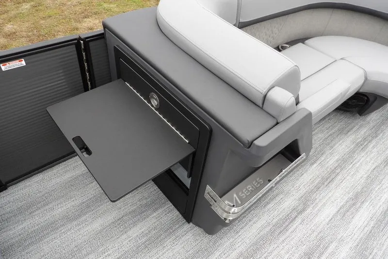 Slide: The Image of 2026 Bennington M L-Bench 22 ML boat interior with sleek seating and storage. - 19