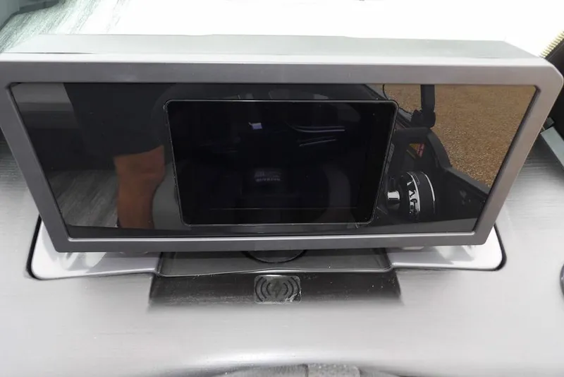 Slide: The Image of 2026 Bennington M L-Bench 22 ML dashboard with modern touchscreen display. - 25