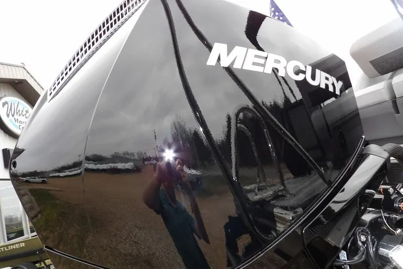 Slide: The Image of Close-up of a Mercury engine on a 2026 Bennington M L-Bench 22 ML boat. - 45