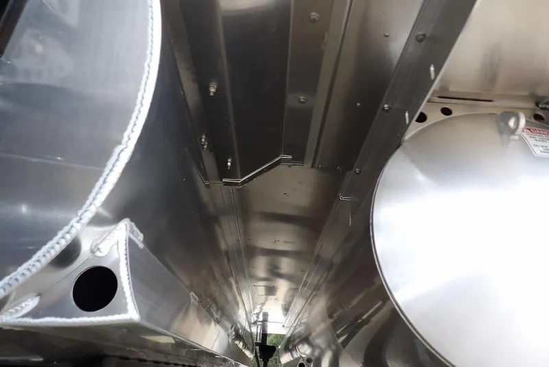 Slide: The Image of Interior view of 2026 Bennington M L-Bench 22 ML pontoon boat, showcasing metallic components. - 53