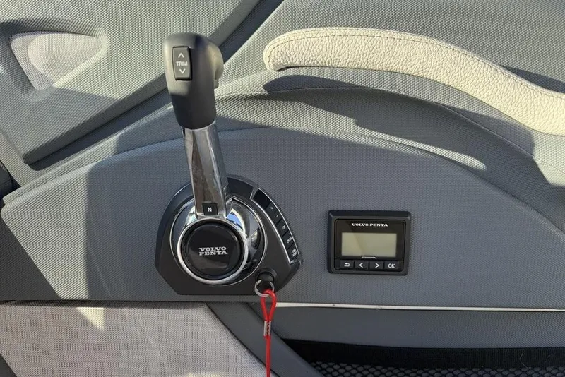 Slide: The Image of 2017 Cobalt R3 boat control panel with Volvo Penta throttle and display. - 26