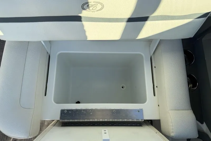 Slide: The Image of 2017 Cobalt R3 boat seat storage compartment, open and empty. - 28
