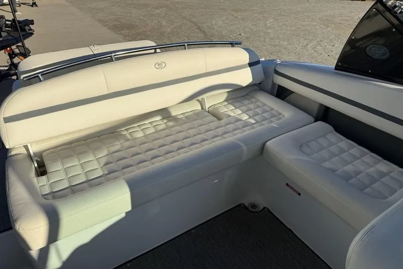 Slide: The Image of 2017 Cobalt R3 boat interior with beige cushioned seating. - 30