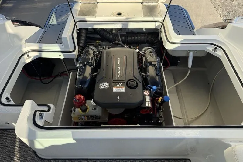 Slide: The Image of Engine compartment of a 2017 Cobalt R3 boat, featuring a Volvo Penta engine. - 37