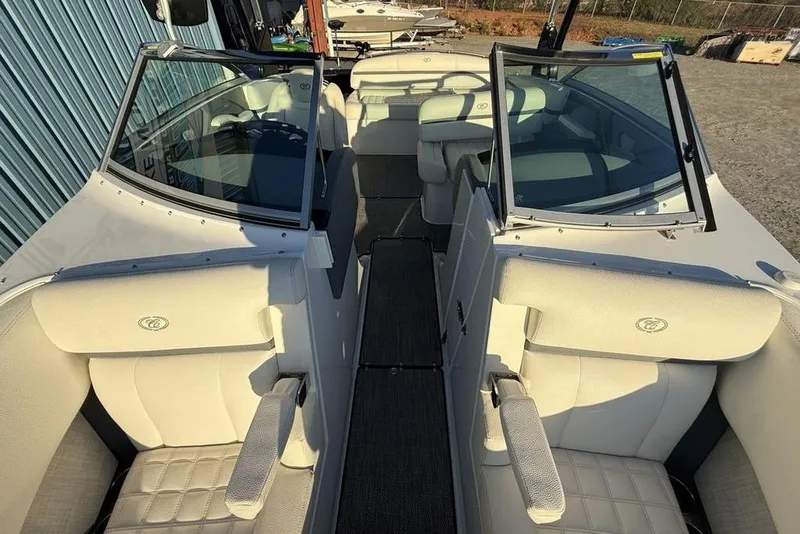 Slide: The Image of 2017 Cobalt R3 boat interior with white seating and open windshield. - 49